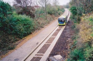 A test run on the guided busway, looking east along the railway cutting from Shelford Road bridge. Photo: Peter Dawson, early 2011.