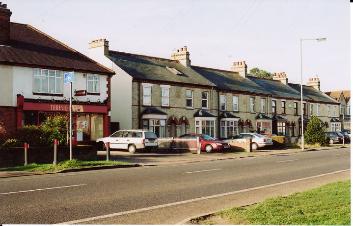 Looking from the former grocer�s (Threshers off-license) to the former butcher�s (Design Matters kitchen design shop) on the west side of Shelford Road, numbers 152-132. Photo: Andrew Roberts, 27 January 2008.