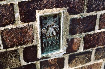 Ordnance Survey bench mark on Shelford Road railway bridge. Photo: Andrew Roberts, 17 February 2008.