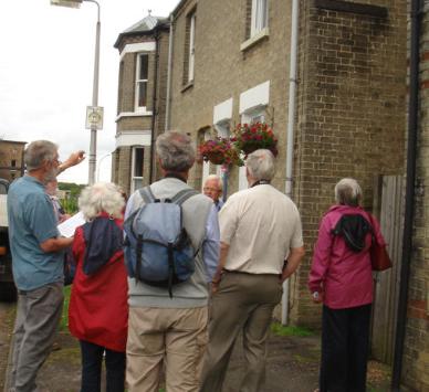 The houses at the far end of Alpha Terrace with ‘Aboyne Cottages’ on the side wall, Local History Group walk. Photo: Philippa Slatter, 1 July 2012.