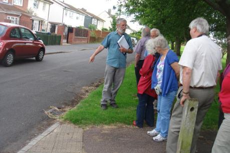 One of the drains which take surface water to Hobson’s Brook, Byron’s Square, Local History Group walk. Photo: Philippa Slatter, 1 July 2012.